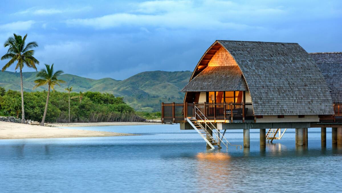 An overwater "bure" at Fiji Marriott Resort Momi Bay.
