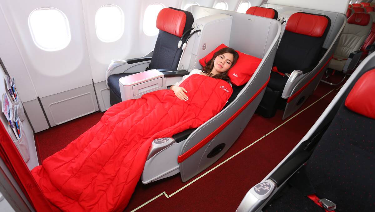 Sweet dreams on low-cost AirAsia's flatbed.