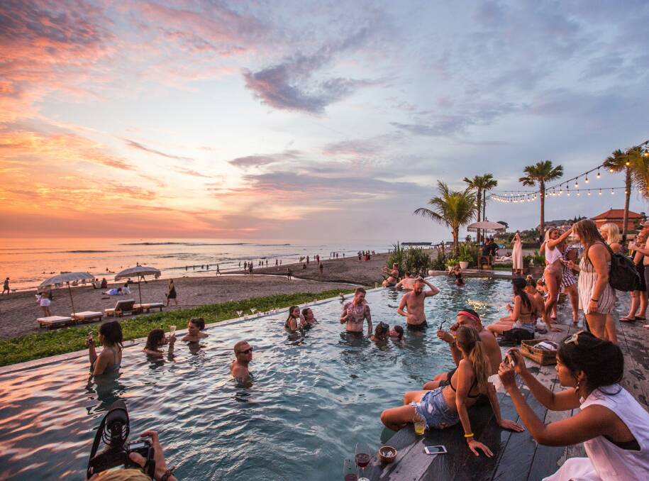 A happening beach club in Bali. Picture: Unsplash/Cassie Gallegos