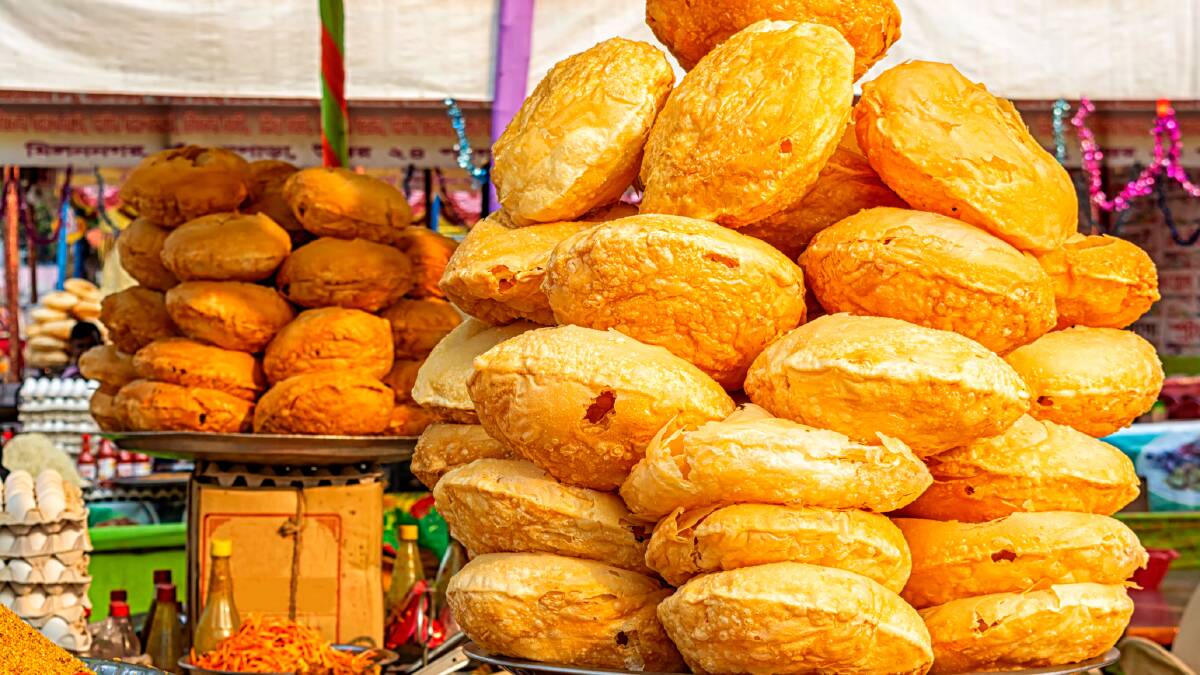 Deep fried Bengali bread on a fair stall. Picture: Getty Images