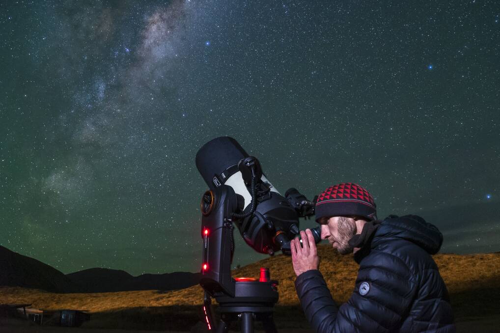 Checking out the Milky Way on a stargazing tour. Picture: Joseph Pooley