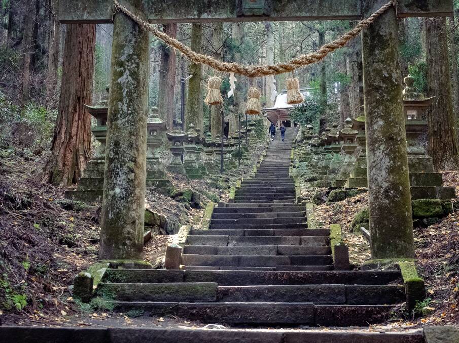 The holy site of Kamishikimi Kumanoimasu, with 100 stone lanterns leading up almost 300 steps. Picture: Emily McAuliffe