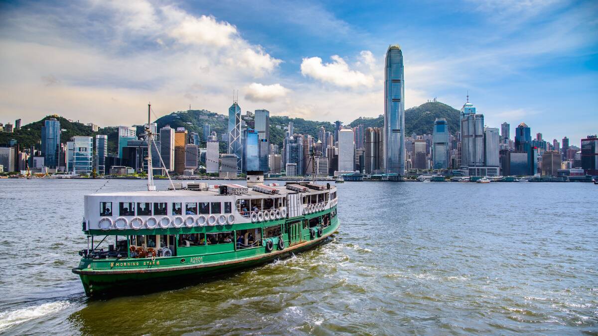 The Star Ferry plies its time-honoured route.