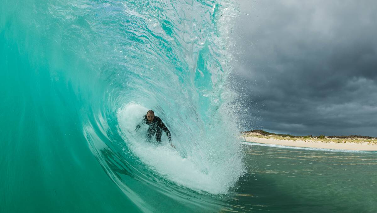 Surfing on KI. Picture: Stu Gibson