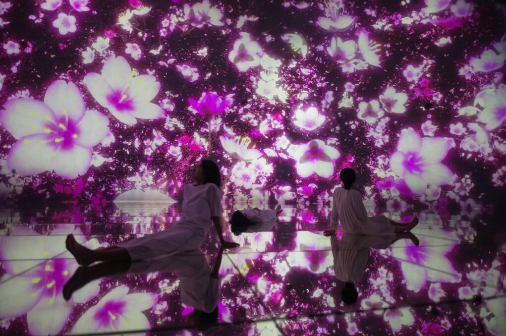 Floating in the Falling Universe of Flowers at Tokyo's teamLab Planets.