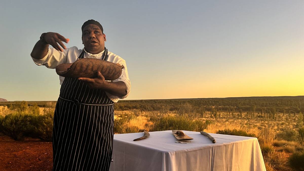 Award-winning chef Marcellus Ah Kit introduces the bush foods used in the Tali Wiru sunset meal near Uluru. Picture: Saffron Howden