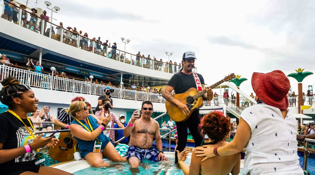 Michael Franti performing on a Soulshine cruise in 2021.