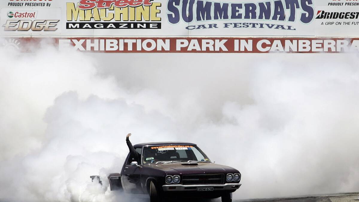 A car performs in the burnout competition at the Street Machine Summernats festival in Canberra. Picture: Getty Images