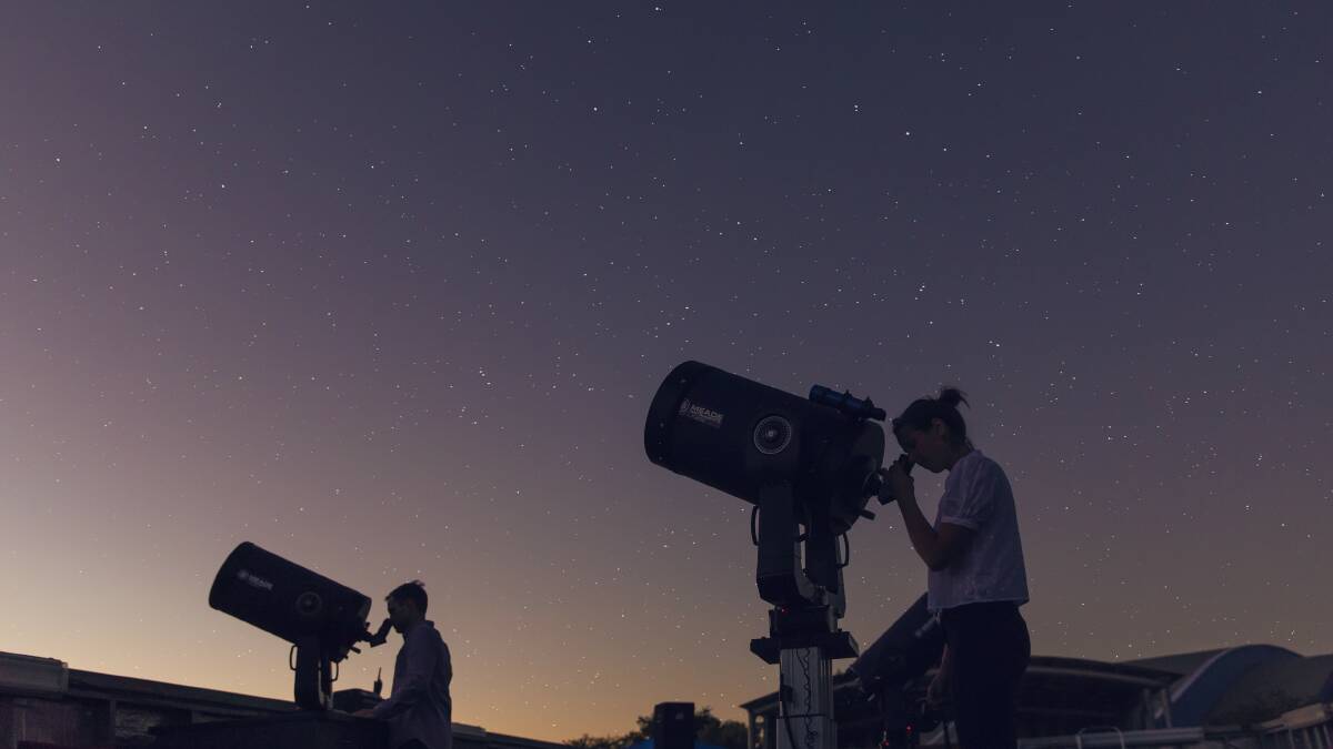 Exploring the night sky at the Cosmos Centre. Picture: Tourism and Events Queensland