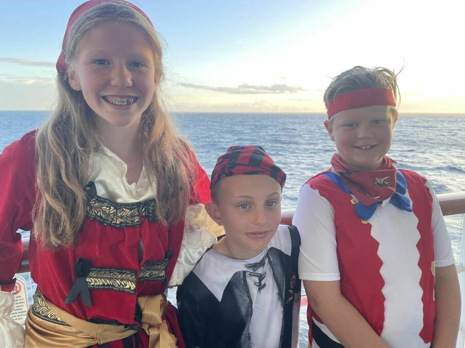 My daughter Maggie (left) and son Louis (right) and Louis' friend Jack (middle) dressed up for pirate night on the cruise. Picture by Megan Doherty 