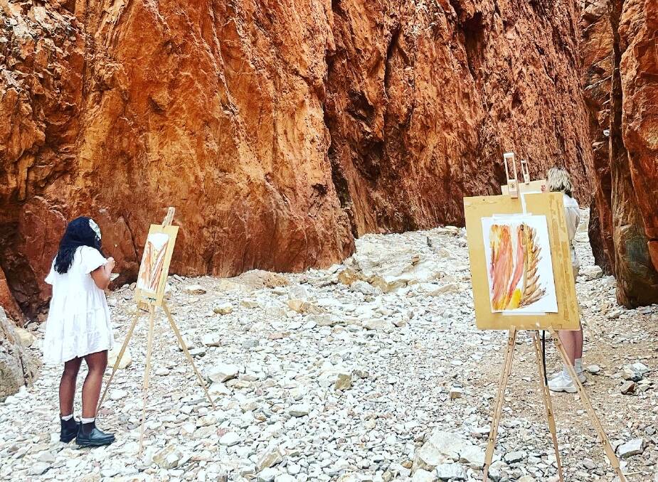 Painting Standley Chasm in water colour proved challenging amid a desert rain shower. Picture: Josh Leeson