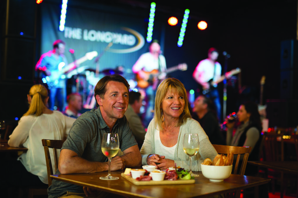 Couple enjoying the live music and bistro dining at The Longyard Hotel, Tamworth.