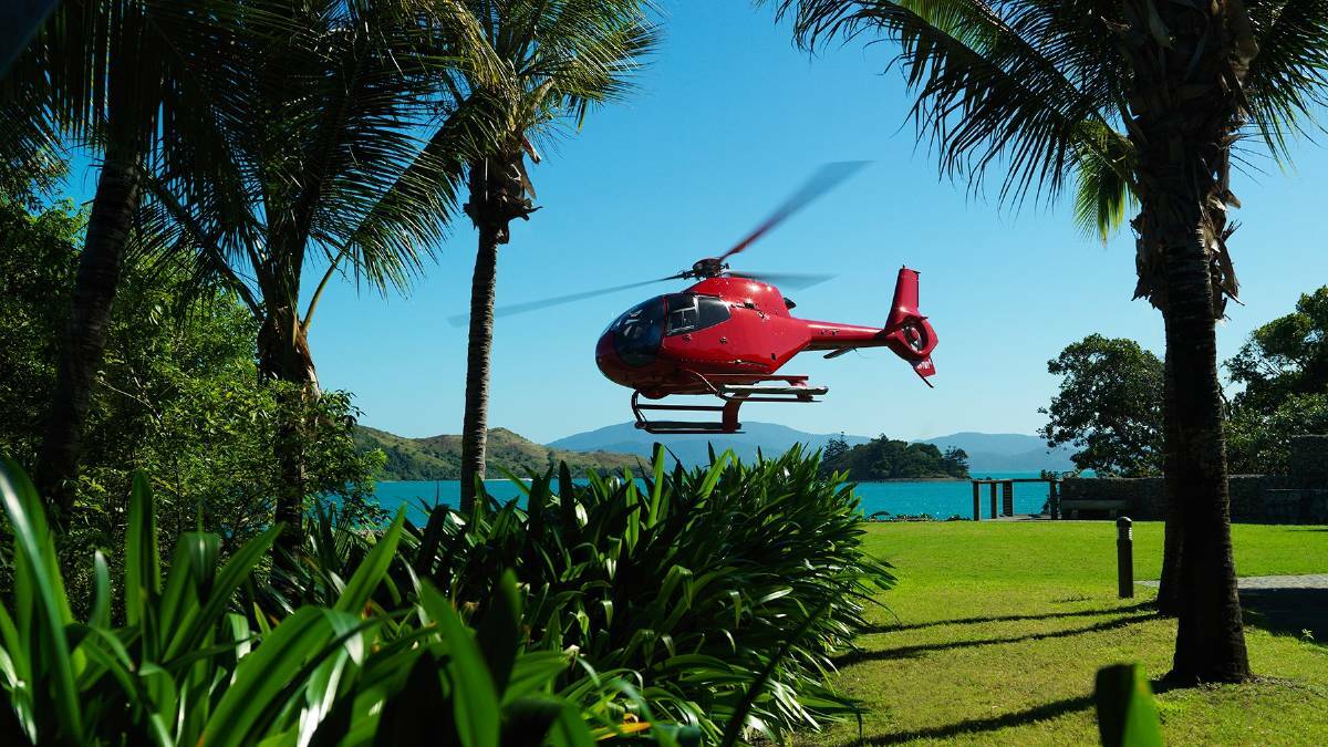 A private helicopter arriving in Qualia, Queensland.