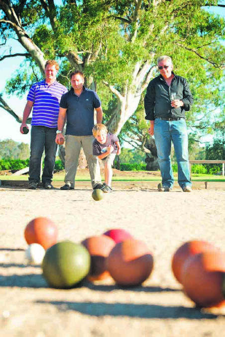 Michael, Christian and Otto Dal Zotto playing bocce
