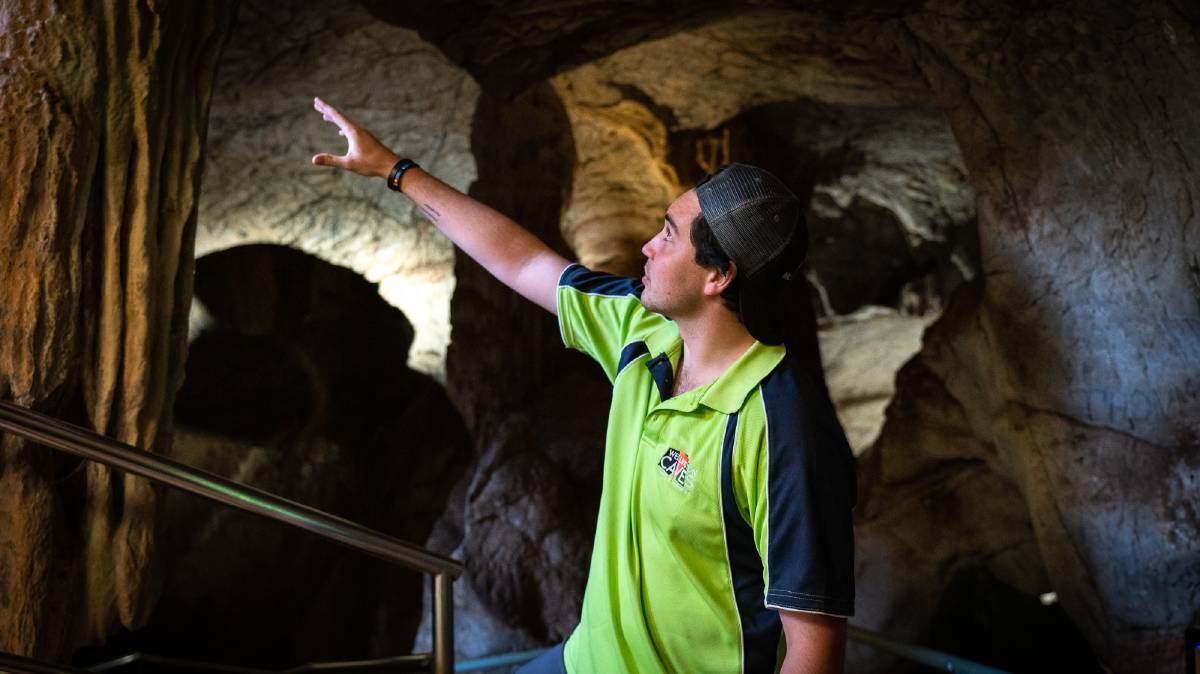 Guide Isaac George is the fourth generation of his family to work at Wellington Caves.