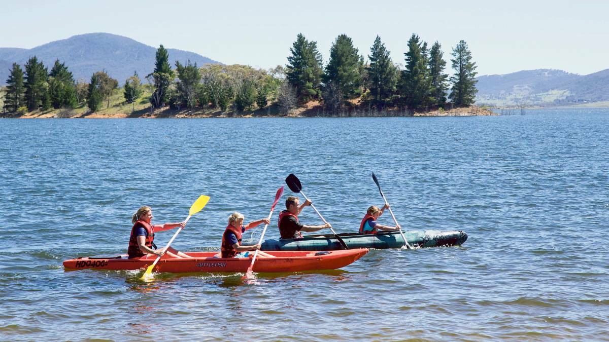 A scenic kayak on Lake Jindabyne in the Snowy Mountains is the perfect family day out.